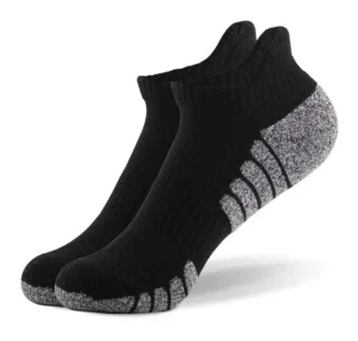 Pair of grey low-cut GollThing Trainer golf socks with cushioned heel, arch support, and moisture-wicking fabric