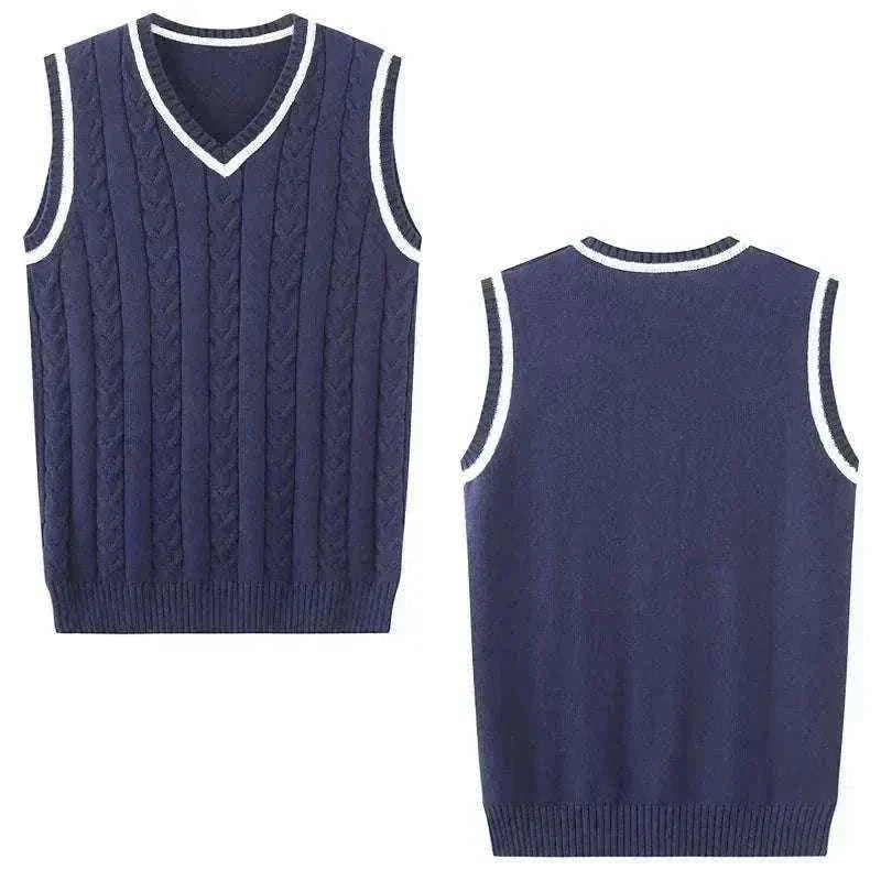 Golf sweater vest in navy cable knit with white-trimmed V-neck and armholes, shown from front and back