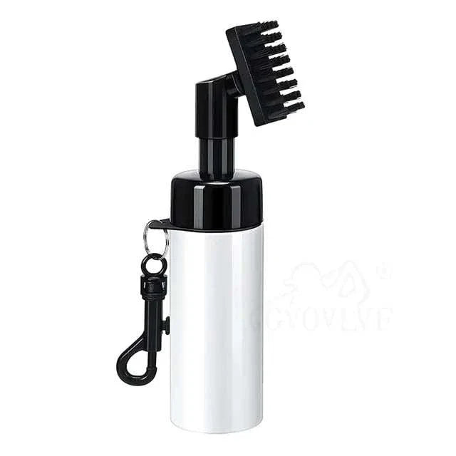 White golf club cleaner brush with hanging clip and squeezable bottle for easy golf club cleaning