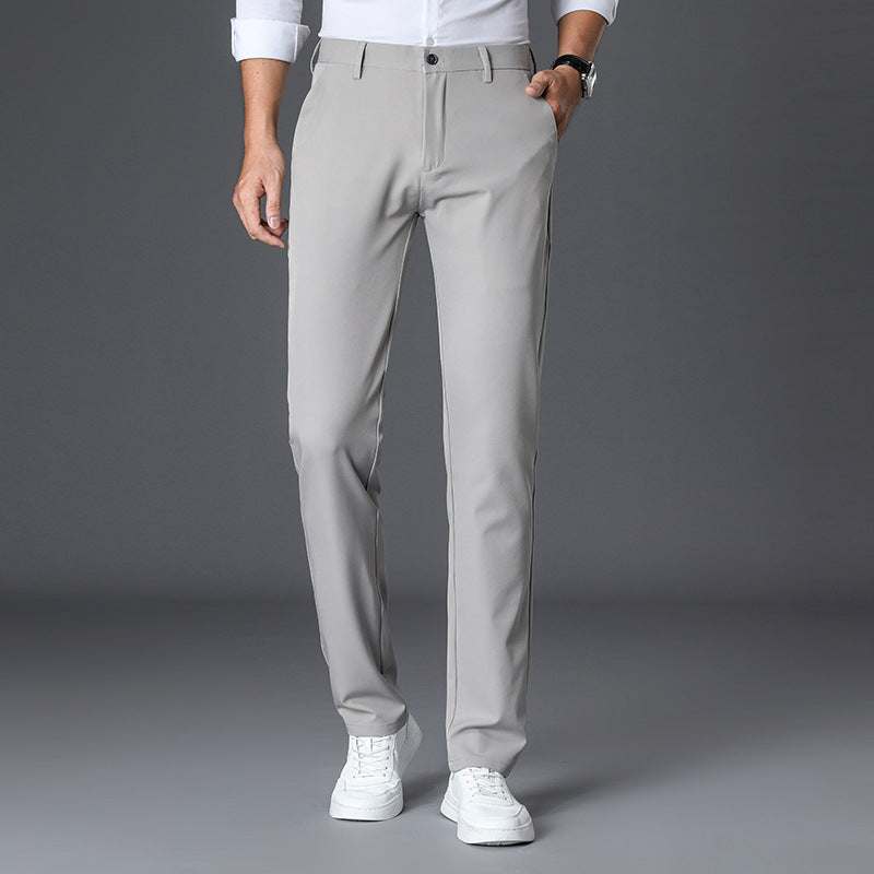 GolfThing Winter Golf Trousers in light gray, smooth woven fabric with a solid pattern, slim tailored fit and belt loops.