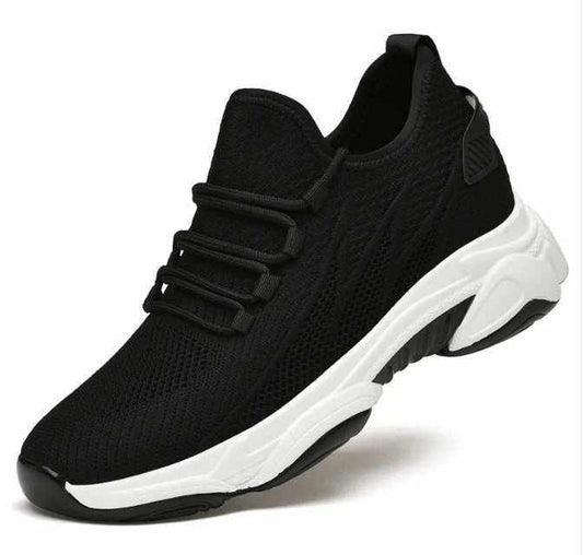 GolfThing Cushion-1 Golf Trainers, black breathable mesh with elastic lace bands and a sculpted white cushioned sole.