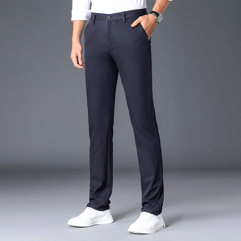 GolfThing Winter Golf Trousers in navy, smooth woven fabric with a solid pattern, slim tailored fit and belt loops.