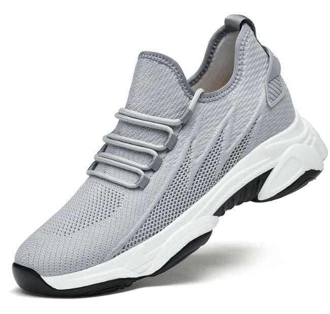 GolfThing Cushion-1 Golf Trainers in grey breathable mesh with a knit pattern, elastic lace bands and chunky cushioned sole.