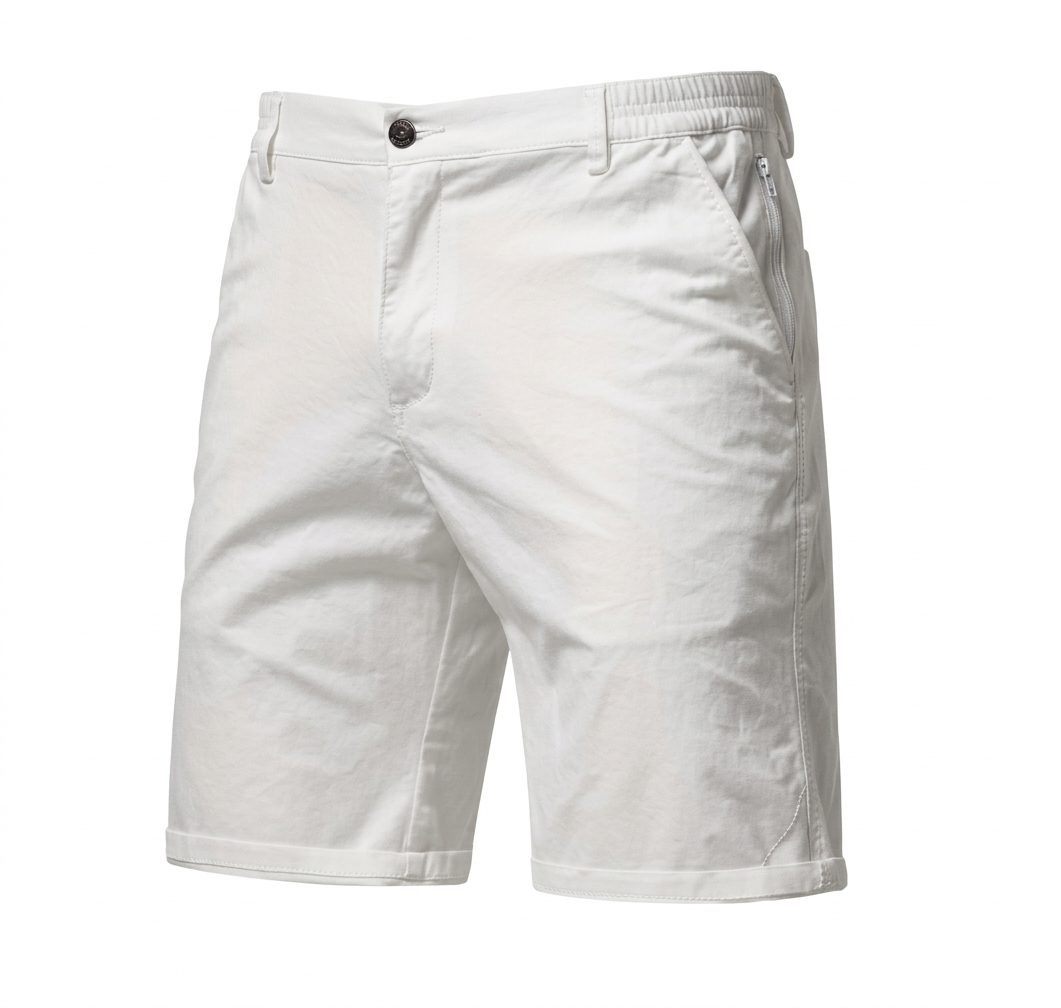 A pair of slim fit, straight leg white golf shorts with a tailored design.