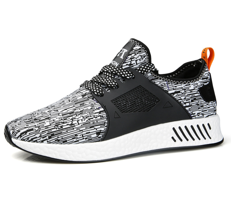 GolfThing Lightweight Golf Trainers in black and white patterned mesh with black overlays, white sole and orange heel tab.