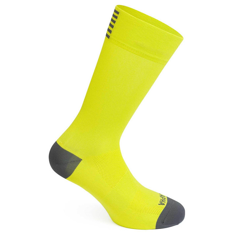 Pair of GolfThing breathable supportive golf socks in white and black with reinforced heel and toe
