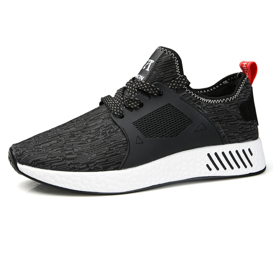 GolfThing Lightweight Golf Trainers, black mesh low-top shoe with textured panels, black laces, white sole and red heel tab.