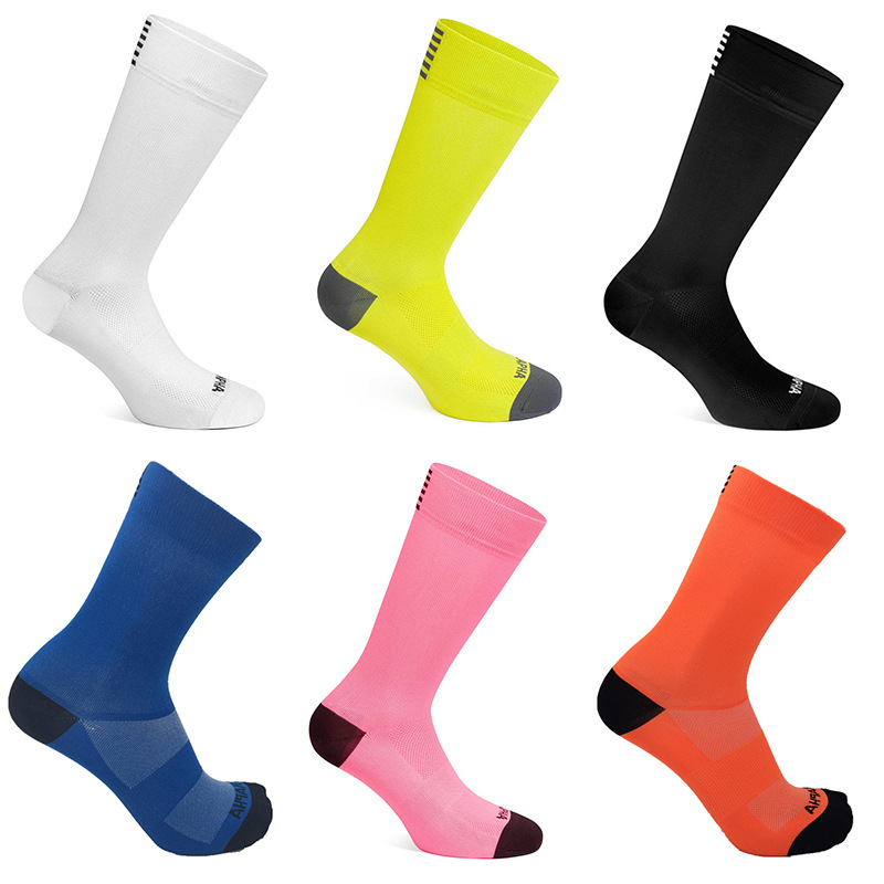 Pair of GolfThing breathable supportive golf socks with reinforced heel, arch support, and seamless toe design