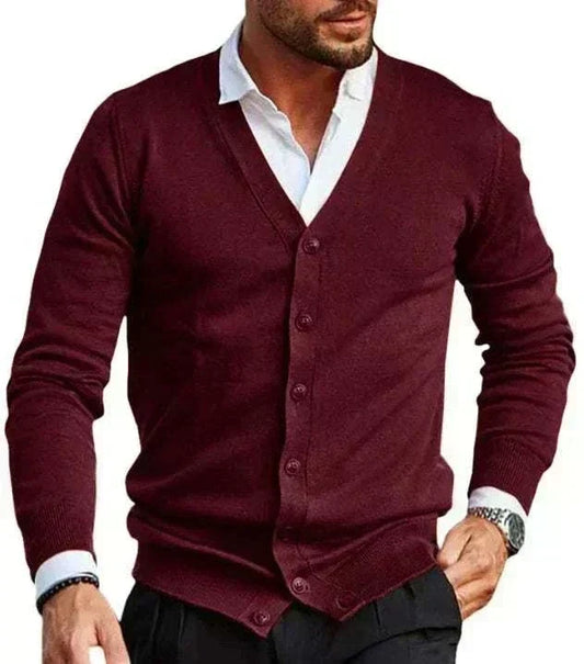 Golf Cardigan in deep burgundy knit with a V-neck, button front and ribbed cuffs, worn over a white shirt