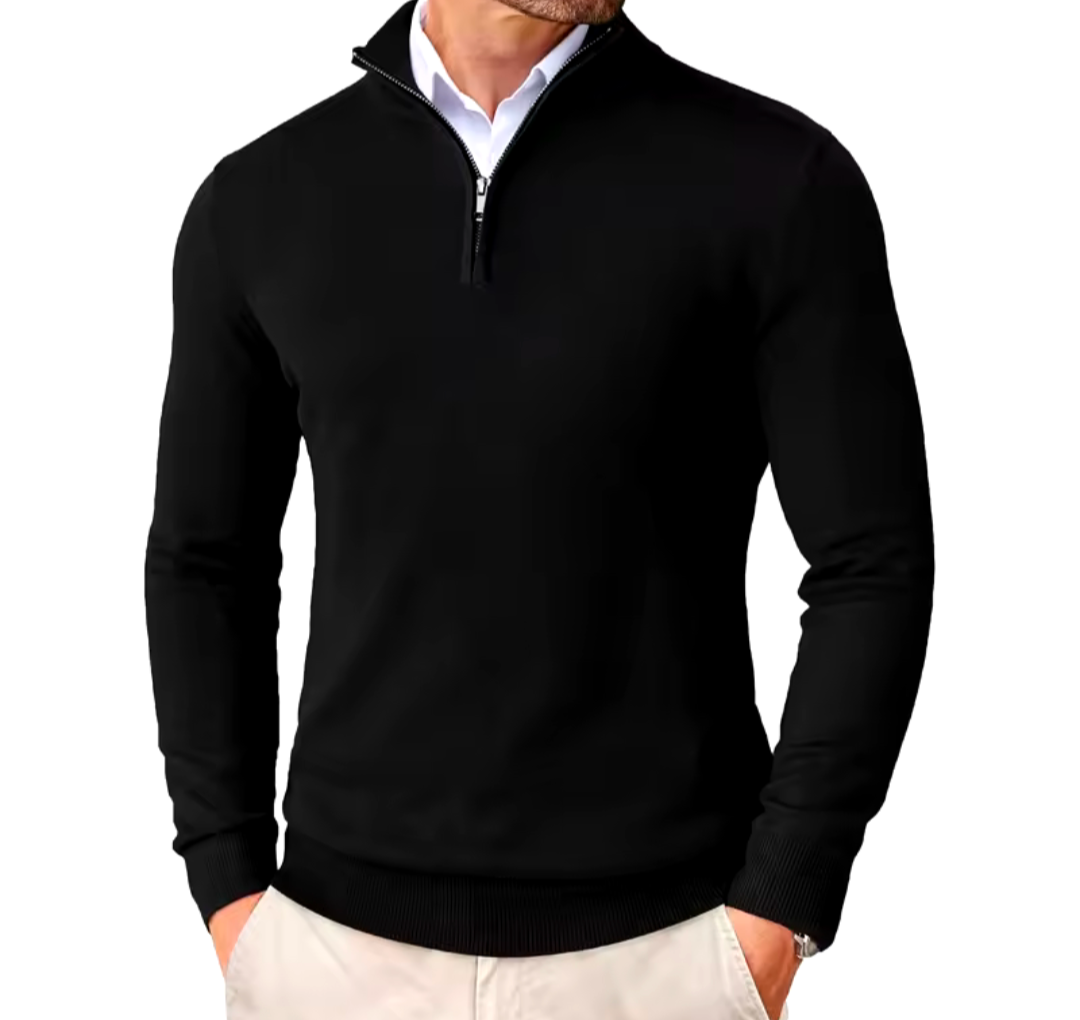 Golf jumper in solid black with a smooth knit appearance, ribbed cuffs and hem, and a short quarter-zip collar