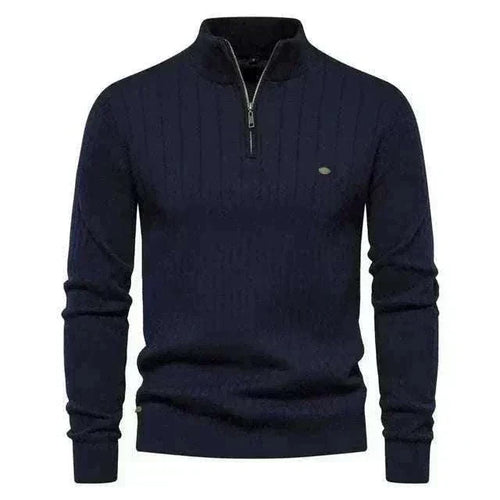 Golf jumper in navy knit cotton with a subtle textured pattern, quarter zip collar, and ribbed cuffs and hem