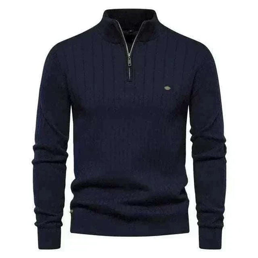 Golf jumper in navy knit cotton with a subtle textured pattern, quarter zip collar, and ribbed cuffs and hem