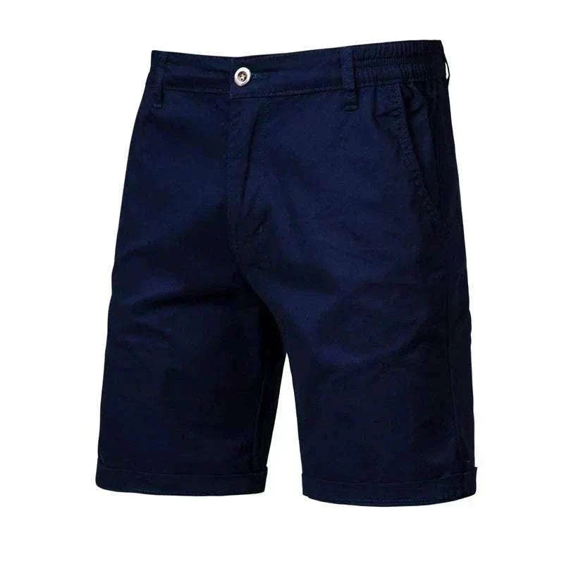 Golf Shorts in solid navy fabric with a tailored straight-leg cut, belt loops, front pockets and button closure