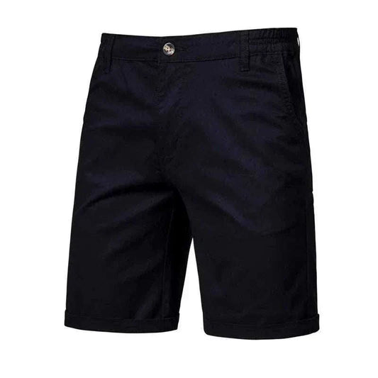 Golf shorts in a deep navy solid fabric, with a tailored straight-leg cut, belt loops, front button and cuffed hems.