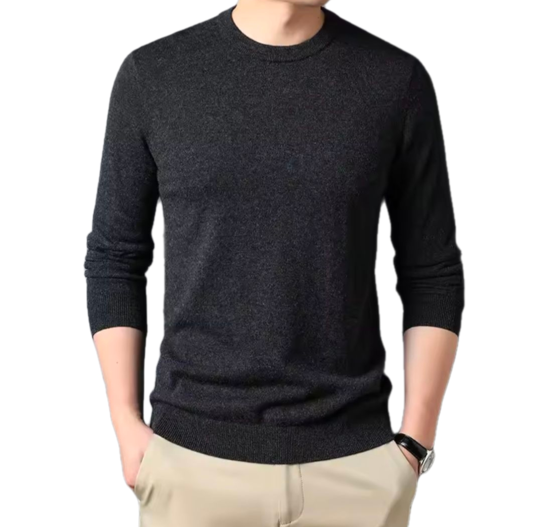 Golf sweater in charcoal grey knit with a classic round neck, long sleeves, and ribbed cuffs and hem