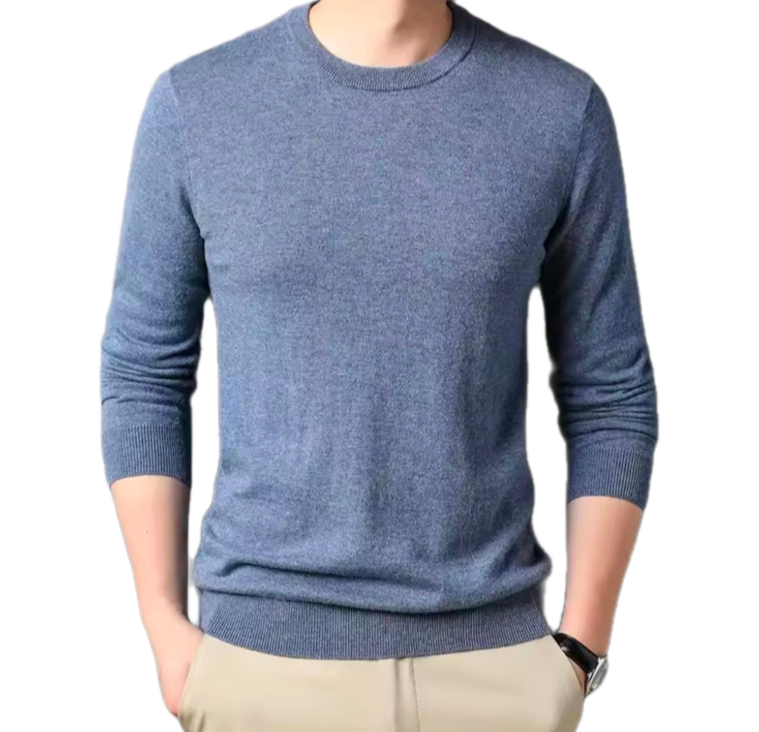 Golf Sweater in muted blue knitted fabric with a classic round neckline, long sleeves and ribbed cuffs and hem