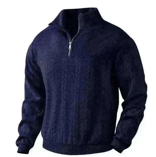 Golf sweater in dark navy knit with a subtle textured pattern, quarter-zip neckline, structured collar, and long sleeves