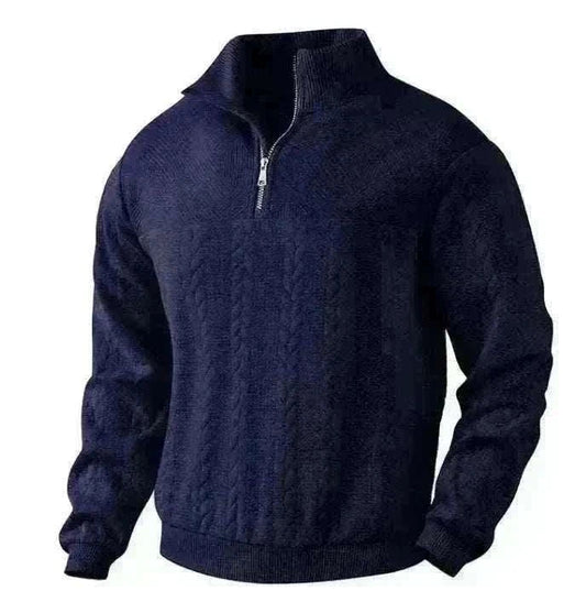 Golf sweater in dark navy knit with a subtle textured pattern, quarter-zip neckline, structured collar, and long sleeves