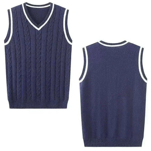 Golf sweater vest in navy cable knit with white-trimmed V-neck and armholes, shown from front and back