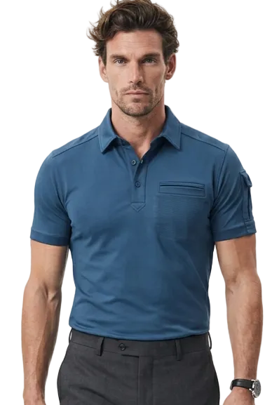 A man modeling a short-sleeve blue golf polo shirt with dark gray trousers and black dress shoes, walking against a plain white studio background.